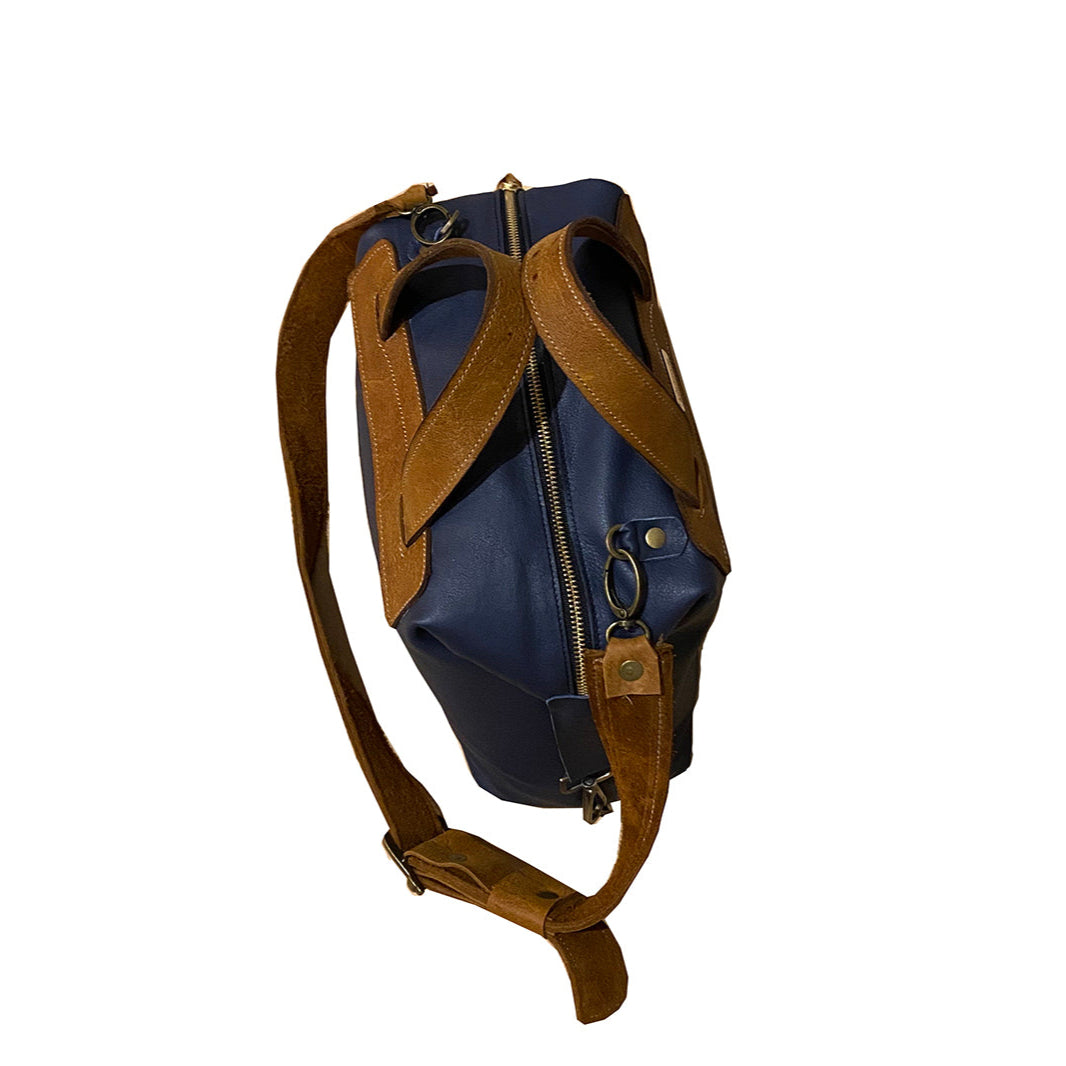 תיק עור כחול נייבי בשילוב עור חום דבש עם כוכב